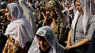 Armenian parishioners attend a national day of prayer for Artsakh (Nagorno-Karabakh) at the Armenian Apostolic Cathedral, near in Yerevan, Armenia, Sunday, Oct. 1, 2023.