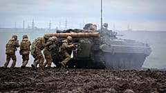 FILE -Ukrainian soldiers during training at the frontline in Donetsk region, Ukraine, Saturday, April 15, 2023.