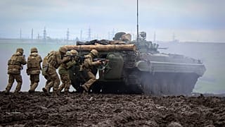 FILE -Ukrainian soldiers during training at the frontline in Donetsk region, Ukraine, Saturday, April 15, 2023.