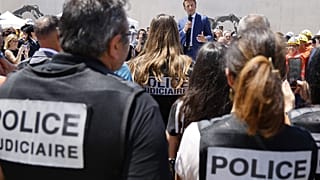 French President Emmanuel Macron speaks...during a visit at the construction site of the Baumettes 3 prison building in Marseille, France, Monday, June 26, 2023.