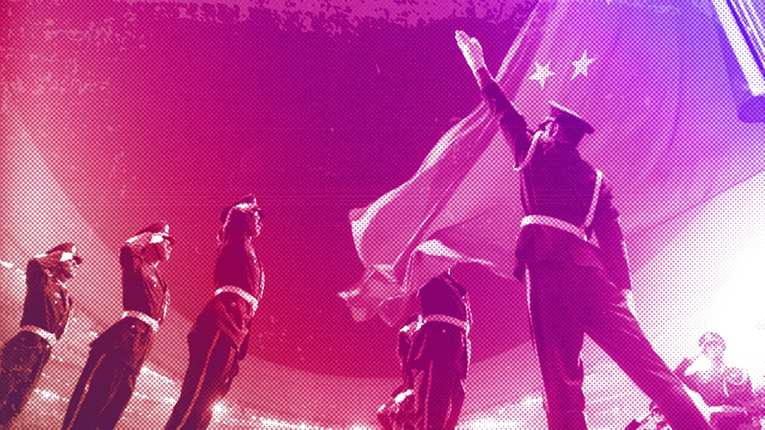 Chinese military soldiers salute as the Chinese flag is raised during the opening ceremony for the Beijing 2008 Olympic Games, August 2008