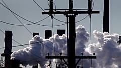Vapour pours from a steel mill chimney in the industrial town of Port Kembla, about 80 km (50 miles) south of Sydney July 7, 2011. 