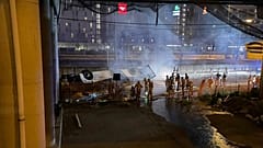 In this image made available by Italian State Police, Italian state police agents attend the scene of a passenger bus accident near the city of Venice, Italy.