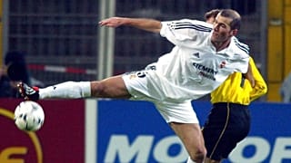 Real Madrid's Zinedine Zidane struggles with Borussia Dortmund's Stefan Reuter during the Champions League second Phase group C match, 2003.