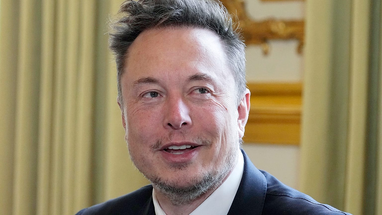 Twitter, now X Corp., and Tesla CEO Elon Musk poses prior to his talks with French President Emmanuel Macron, May 15, 2023