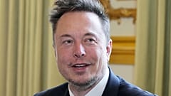 Twitter, now X Corp., and Tesla CEO Elon Musk poses prior to his talks with French President Emmanuel Macron, May 15, 2023