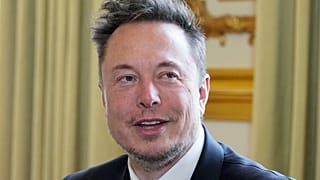 Twitter, now X Corp., and Tesla CEO Elon Musk poses prior to his talks with French President Emmanuel Macron, May 15, 2023