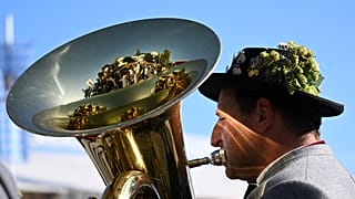 A brass musician plays his instrument during the the last day of the Oktoberfest beer festival in Munich, southern Germany, on October 3, 2023.