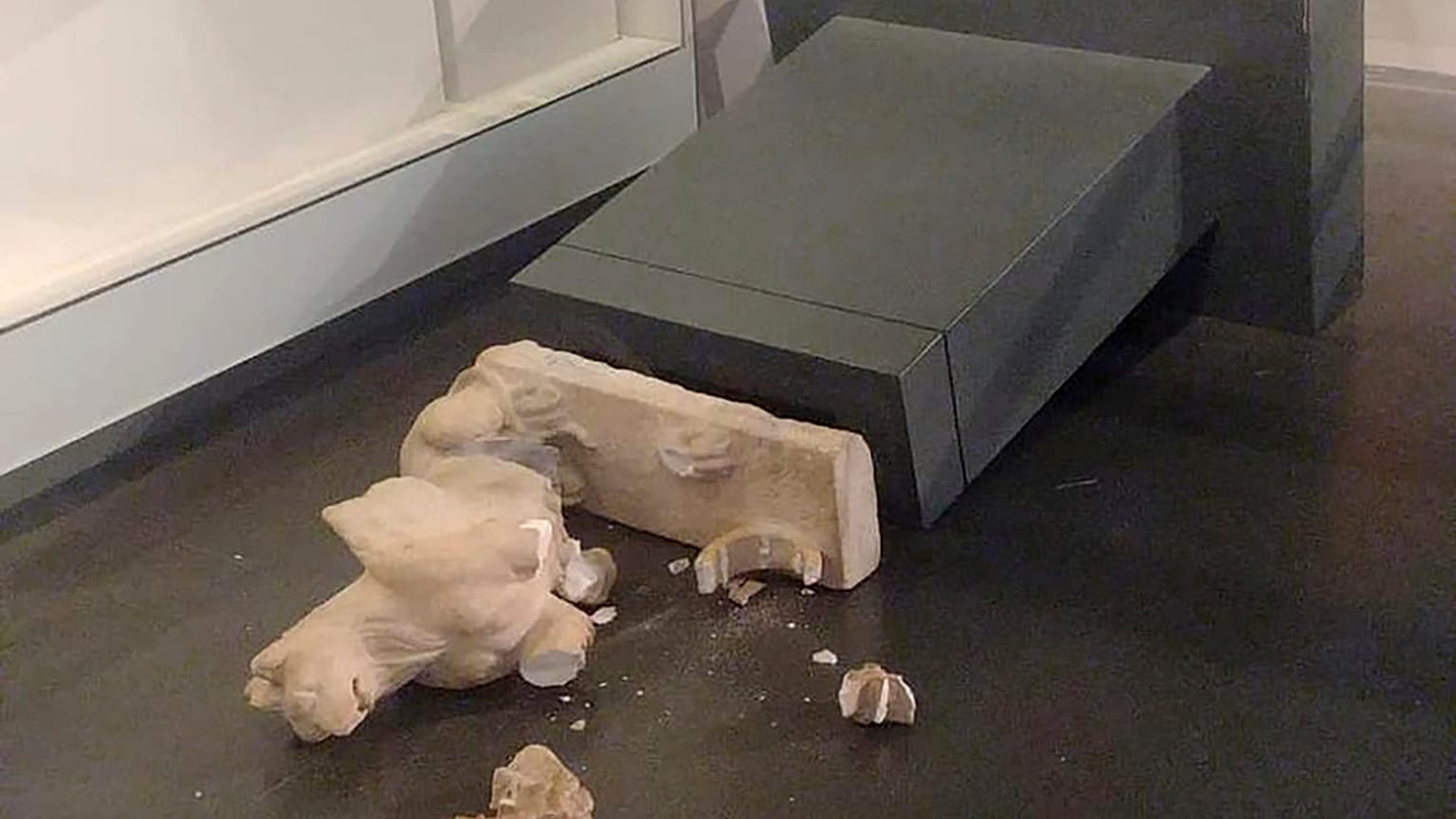 This image released by Israel Police shows an ancient Roman statue toppled at the Israel Museum in Jerusalem, Friday, Oct. 6, 2023