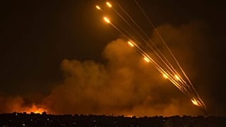 Rockets are fired toward Israel from the Gaza Strip, Sunday, Oct. 8, 2023
