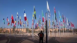 A member of the security forces stands guard outside a convention center hosting the IMF and World Bank annual meetings, in Marrakech, Morocco, Sunday, Oct. 8, 2023.