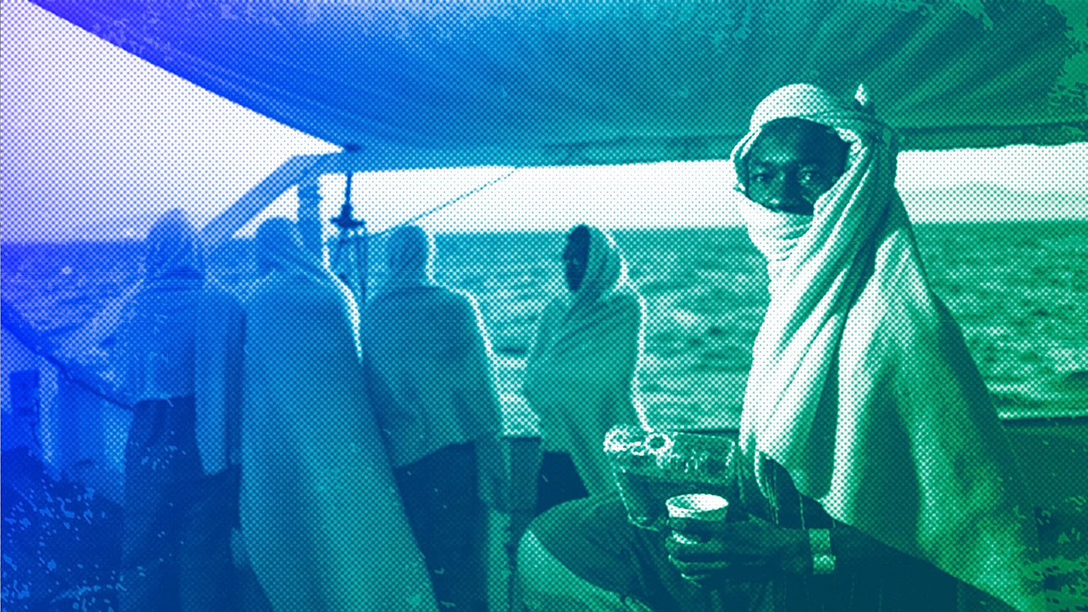 migrants stand on the deck of the Open Arms boat, after being rescued off the coast of Libya, August 2018