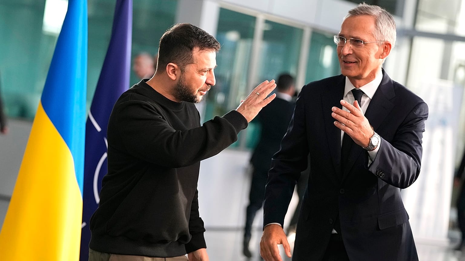 Ukraine's President Volodymyr Zelenskyy and NATO Secretary-General Jens Stoltenberg arrive at NATO headquarters in Brussels on October 11, 2023. 