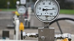 A picture taken on November 28, 2022, shows a pressure gauge on gas pipes at a GRTgaz compressor station, in Morelmaison, eastern France.