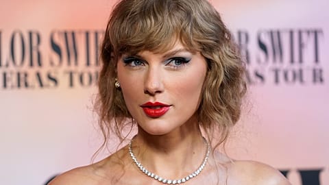 Taylor Swift arrives at the world premiere of the concert film "Taylor Swift: The Eras Tour" on Wednesday, Oct. 11, 2023.