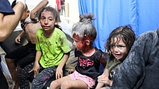 Palestinian children wounded in Israel strikes are brought to Shifa Hospital in Gaza City on Wednesday, Oct. 11, 2023.