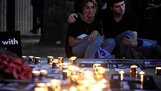 People light candles during the 'Jewish Community Vigil' for Israel in London, Monday, Oct. 9.