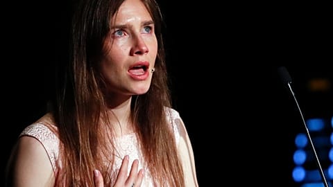 In this June 15, 2019 file photo, Amanda Knox gets emotional as she speaks at a Criminal Justice Festival at the University of Modena, Italy.