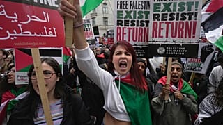 Protesters attend a pro Palestinian demonstration in London, Saturday, Oct. 14, 2023.
