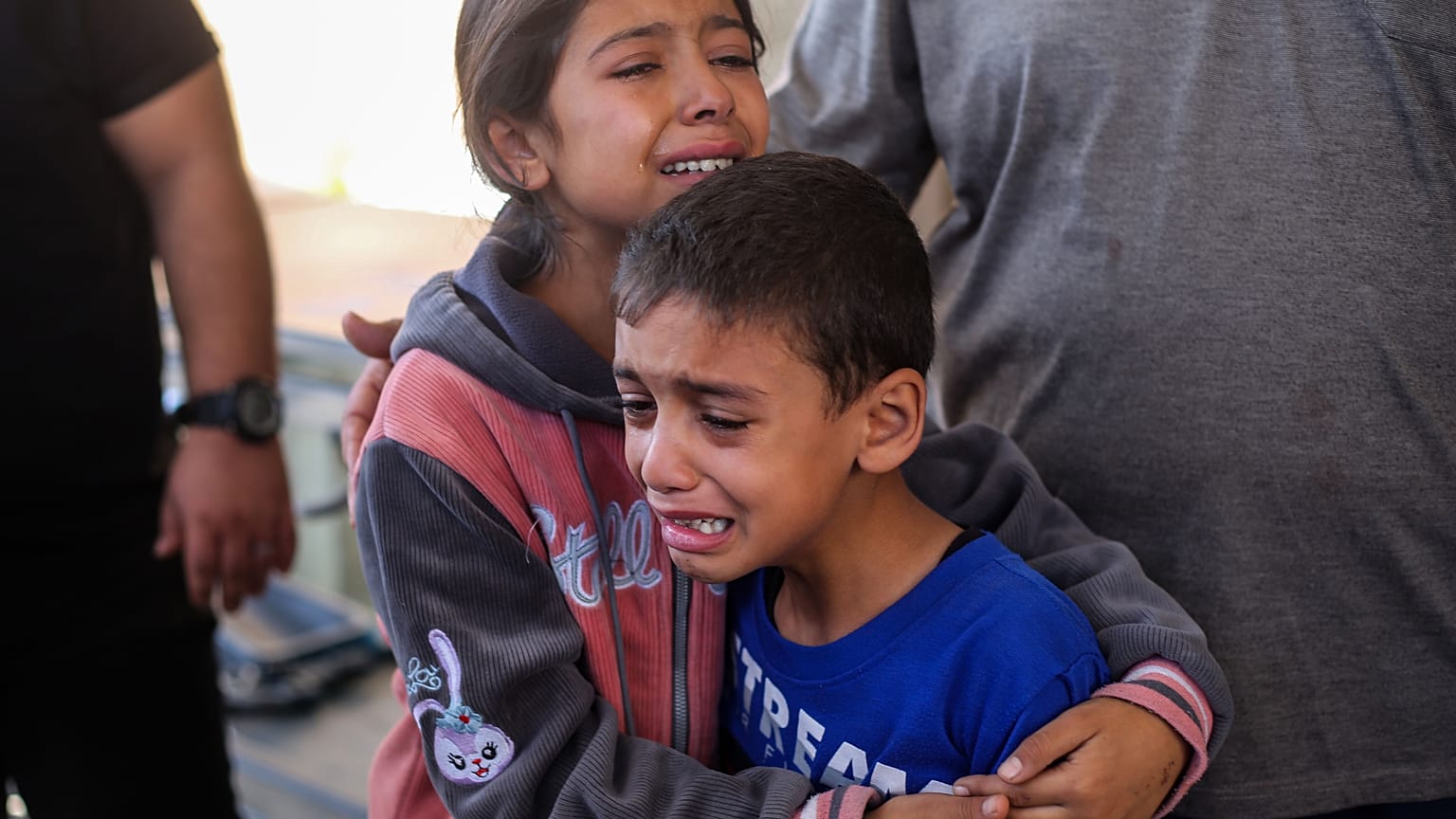 Children crying following Israeli raids in Khan Yunis, Gaza on Sunday