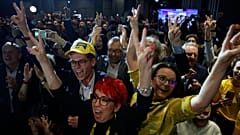 Supporters of the Third Way, a coalition of the centrist Poland 2050 party and the agrarian Polish People's Party celebrate at the electoral headquarters in Warsaw, Poland