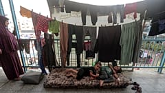 Injured Palestinians arrive at al-Shifa Hospital following Israeli airstrikes on Gaza City, central Gaza Strip, Monday, Oct. 16, 2023.