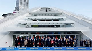 Leaders from EU and Western Balkans countries stand for a family photo in front of Pyramid Hall after Berlin Process Leaders' Summit in Tirana, Albania, Monday, Oct. 16, 2023.
