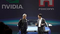 Co-founder, president and CEO of Nvidia Corporation Jensen Huang, left, and Foxconn chairman Young Liu, right.