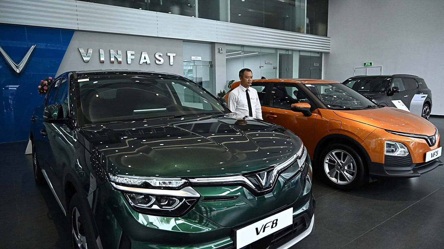 Electric cars on display at a VinFast showroom in Hanoi.