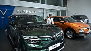 Electric cars on display at a VinFast showroom in Hanoi.
