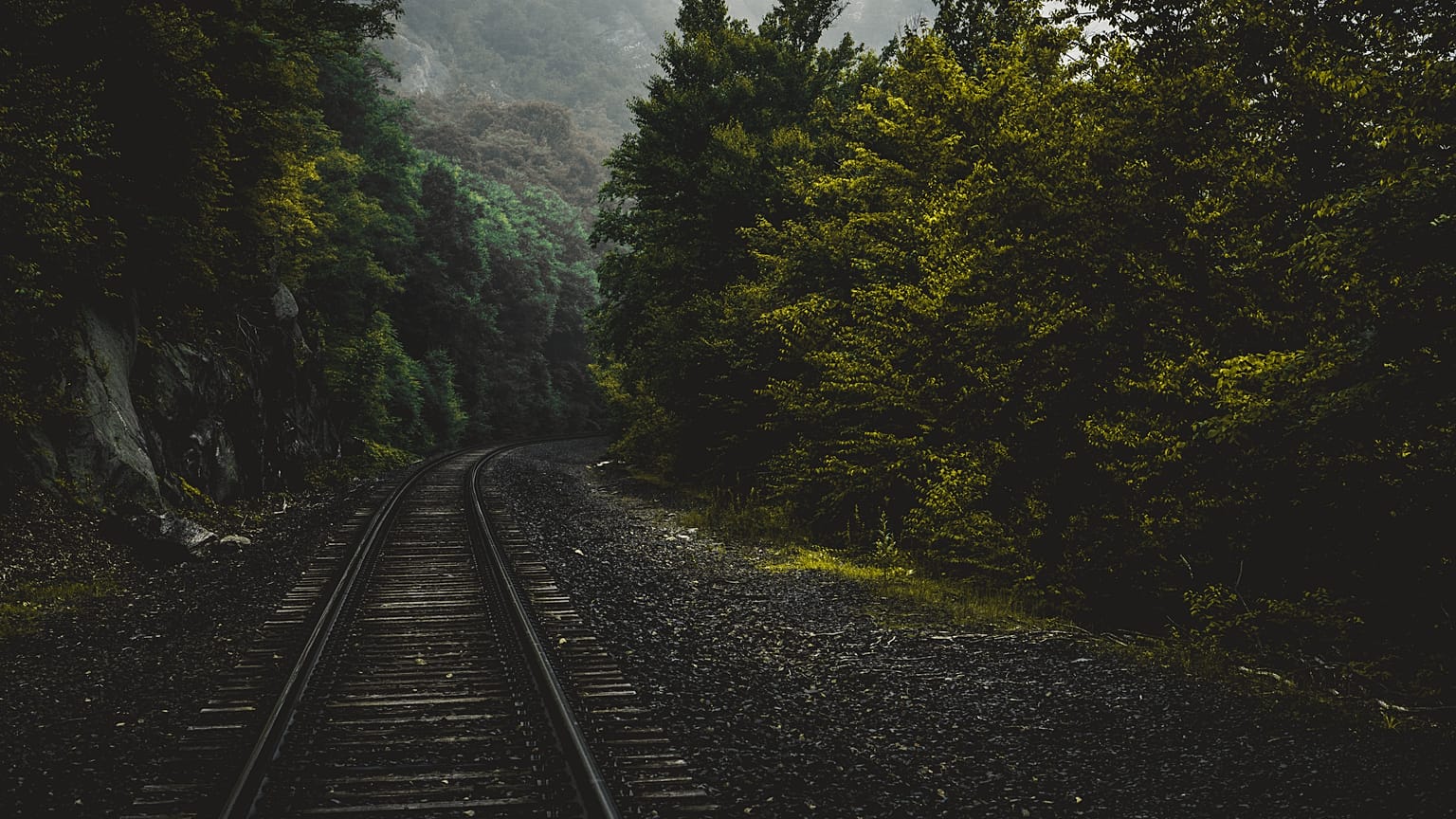 Railways have it all: abandoned stations; the screeching of rusty tracks; the shadowy corners of a vintage rail car. 
