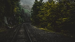 Railways have it all: abandoned stations; the screeching of rusty tracks; the shadowy corners of a vintage rail car.