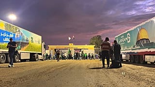Humanitarian aid convoy for the Gaza Strip is parked at the Rafah crossing port, Egypt, Tuesday, Oct. 17, 2023.