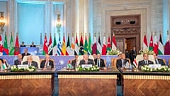 Egyptian President Abdel-Fattah al-Sisi (R), Jordanian King Abdullah II (C) and Palestinian President Mahmoud Abbas (L) attend The Cairo Peace Summit 
