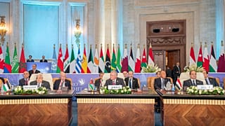 Egyptian President Abdel-Fattah al-Sisi (R), Jordanian King Abdullah II (C) and Palestinian President Mahmoud Abbas (L) attend The Cairo Peace Summit 
