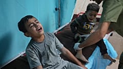 Palestinians wounded in Israeli bombardment wait for treatment in a hospital in Deir al-Balah, south of the Gaza Strip.