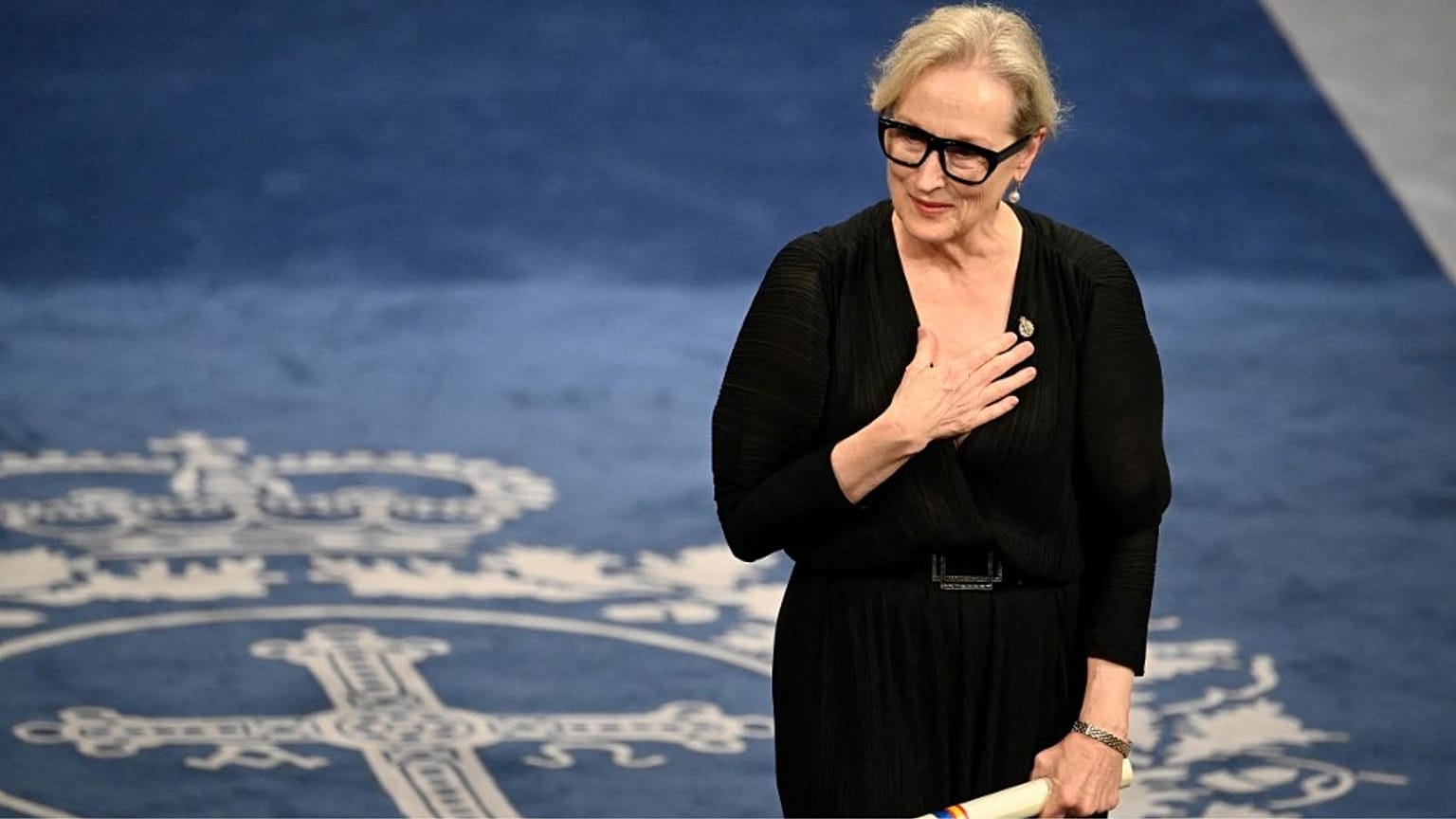 US actress Meryl Streep celebrates on stage after receiving the 2023 Princess of Asturias Award for the Arts at the prize giving ceremony.