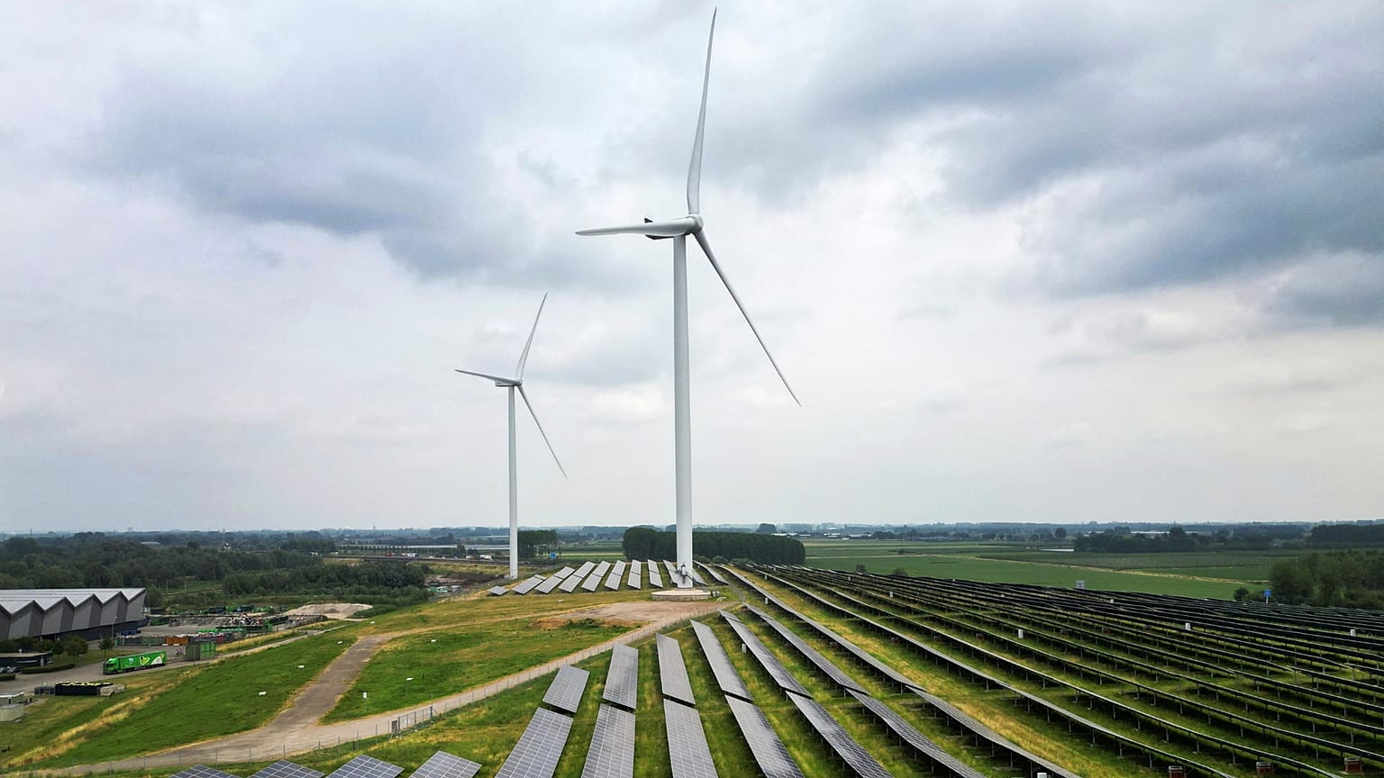 A solar panel park and wind turbines are seen in Geldermalsen, Netherlands.