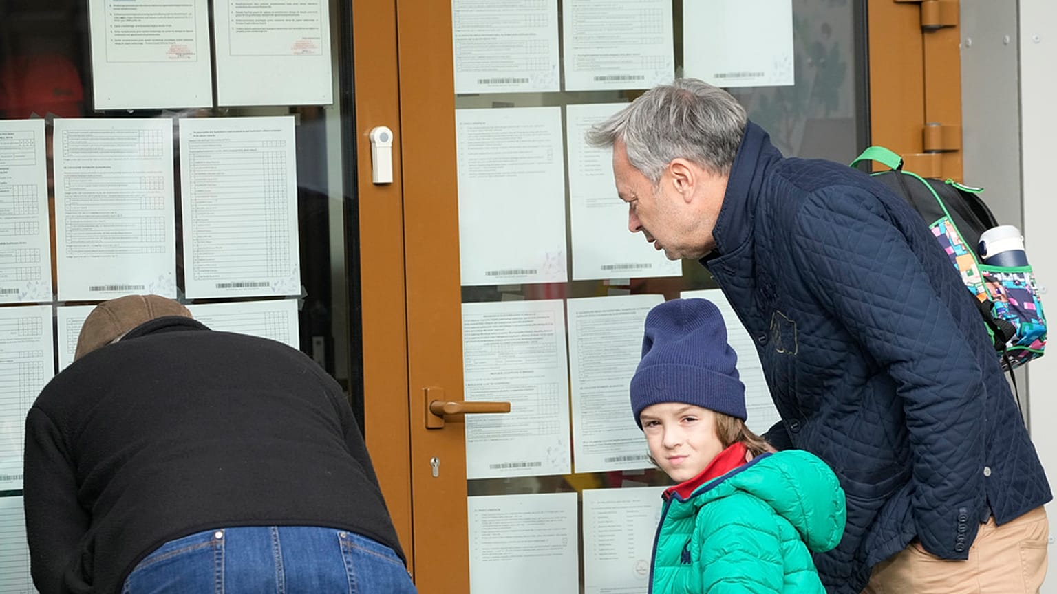People checking the results of elections in Poland, in which more than 73% of eligible voters took part. October, 2023