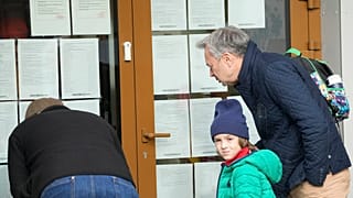 People checking the results of elections in Poland, in which more than 73% of eligible voters took part. October, 2023