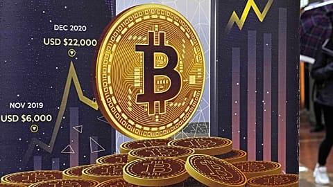 An advertisement for Bitcoin cryptocurrency is displayed on a street in Hong Kong, on Feb. 17, 2022.