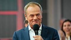 Donald Tusk, a former Polish prime minister addresses supporters at his party headquarters in Warsaw, Poland.