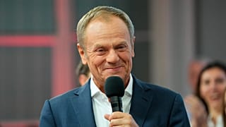 Donald Tusk, a former Polish prime minister addresses supporters at his party headquarters in Warsaw, Poland.
