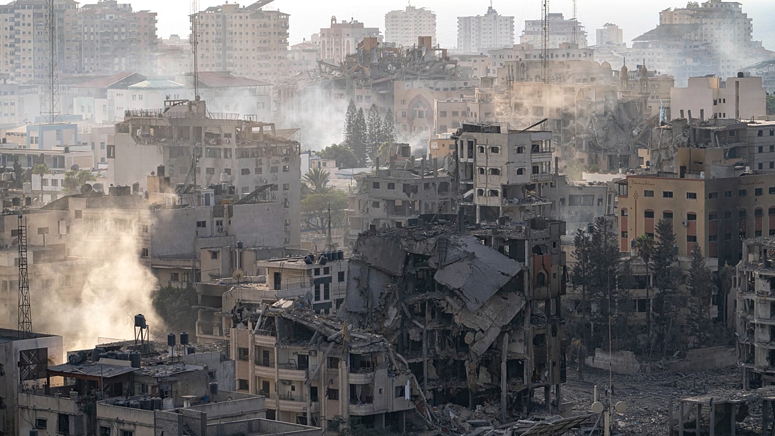 Destruction from Israeli aerial bombardment is seen in Gaza City on Wednesday