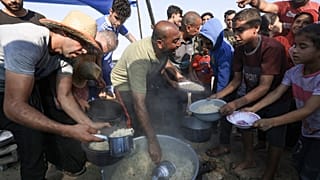 Distribuzione del cibo nel campo profughi di Khan Younis