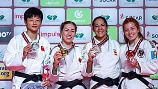Медалистки категории -63 кг, золото у канадки Катрин Бошемен-Пинар.