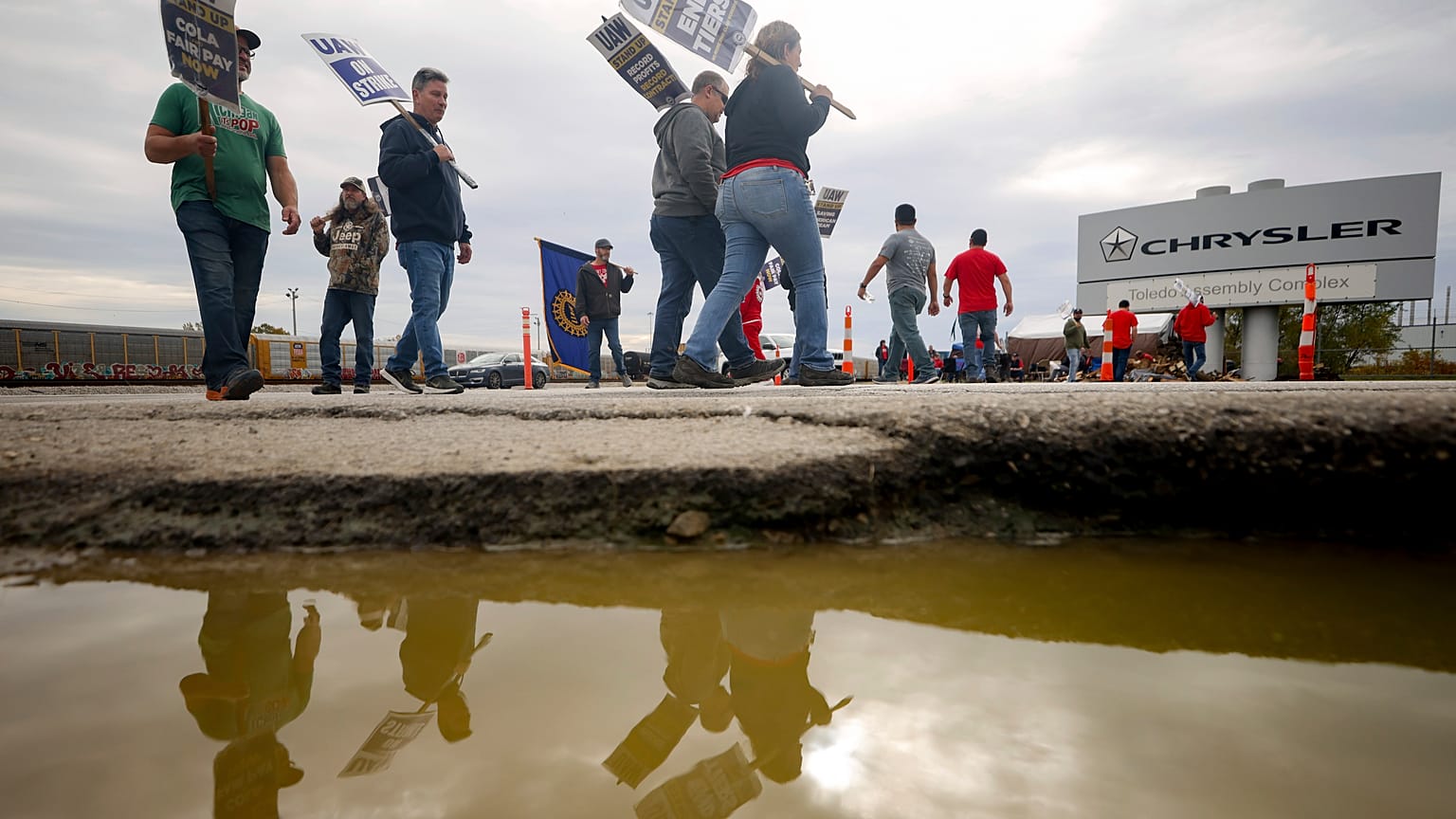 Brian "Rooster" Heppner, a United Auto Workers Local 12 member, pickets during the ongoing UAW strike at the Stellantis Toledo Assembly Complex on Wednesday, Oct. 25, 2023.