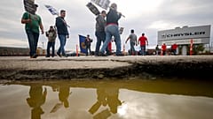Brian "Rooster" Heppner, a United Auto Workers Local 12 member, pickets during the ongoing UAW strike at the Stellantis Toledo Assembly Complex on Wednesday, Oct. 25, 2023.