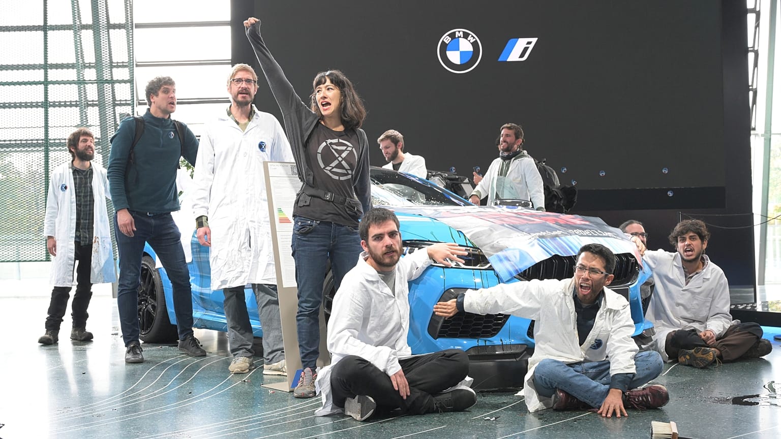 Activists take part in an a non-violent action at a BMW showroom in October last year. 
