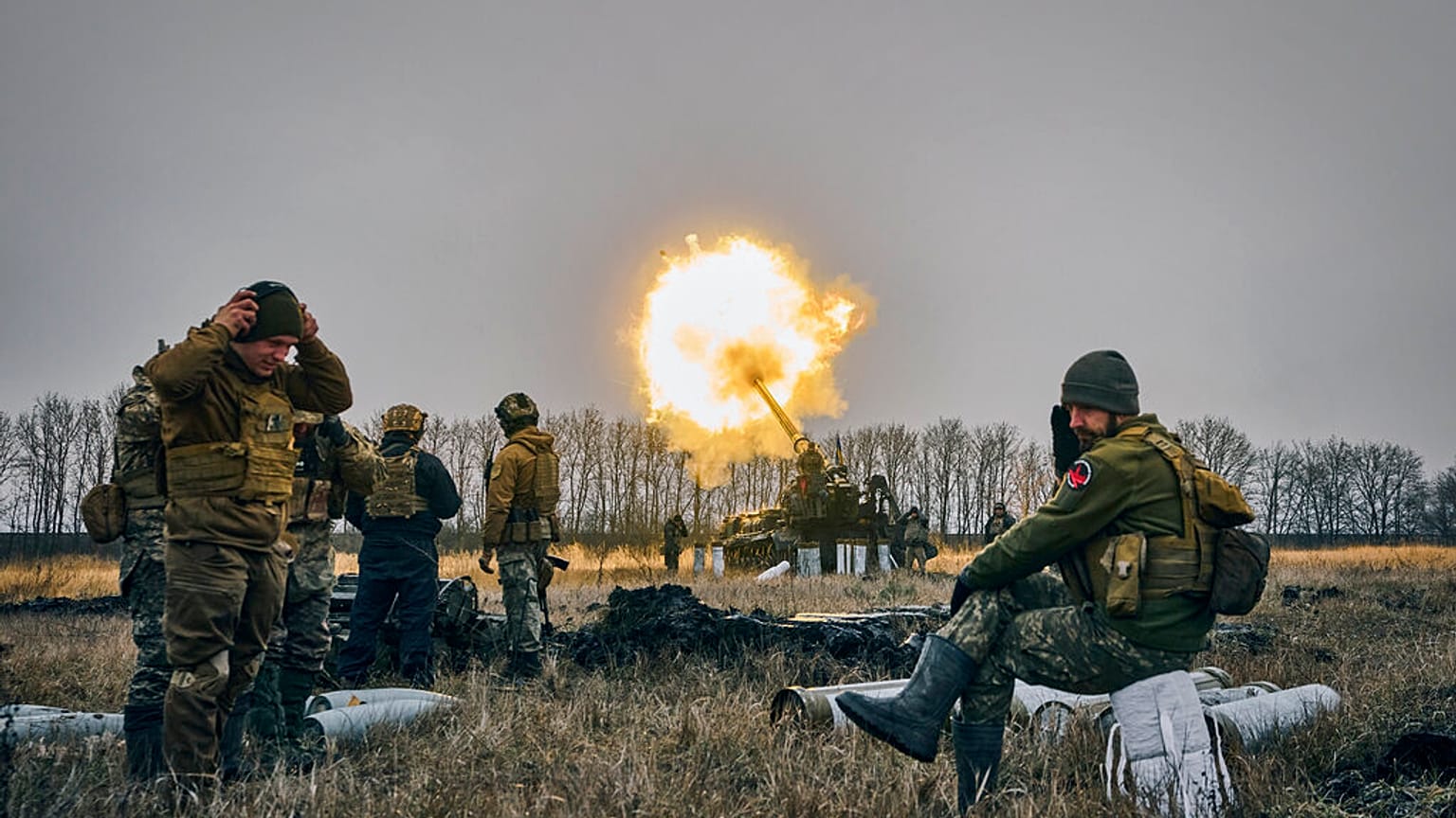 FILE - Ukrainian soldiers fire a Pion artillery system at Russian positions near Bakhmut, Donetsk region, Ukraine, Friday, Dec. 16, 2022.